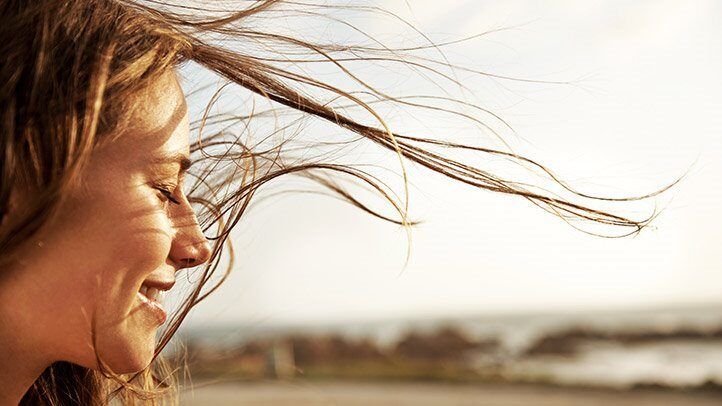 hair blowing in the wind