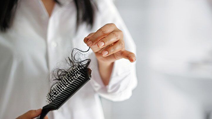 a hair brush full of hair